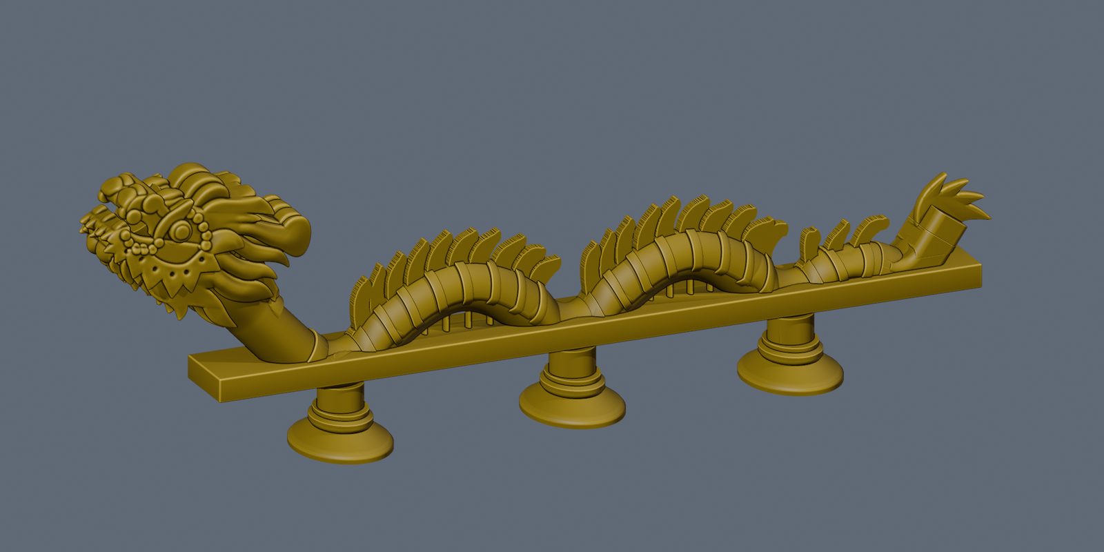 A render of the current lamp: a fuller golden dragon with a large detailed head on a raised neck, two ridged arches and a flame-tipped tail over a flat deck on three feet